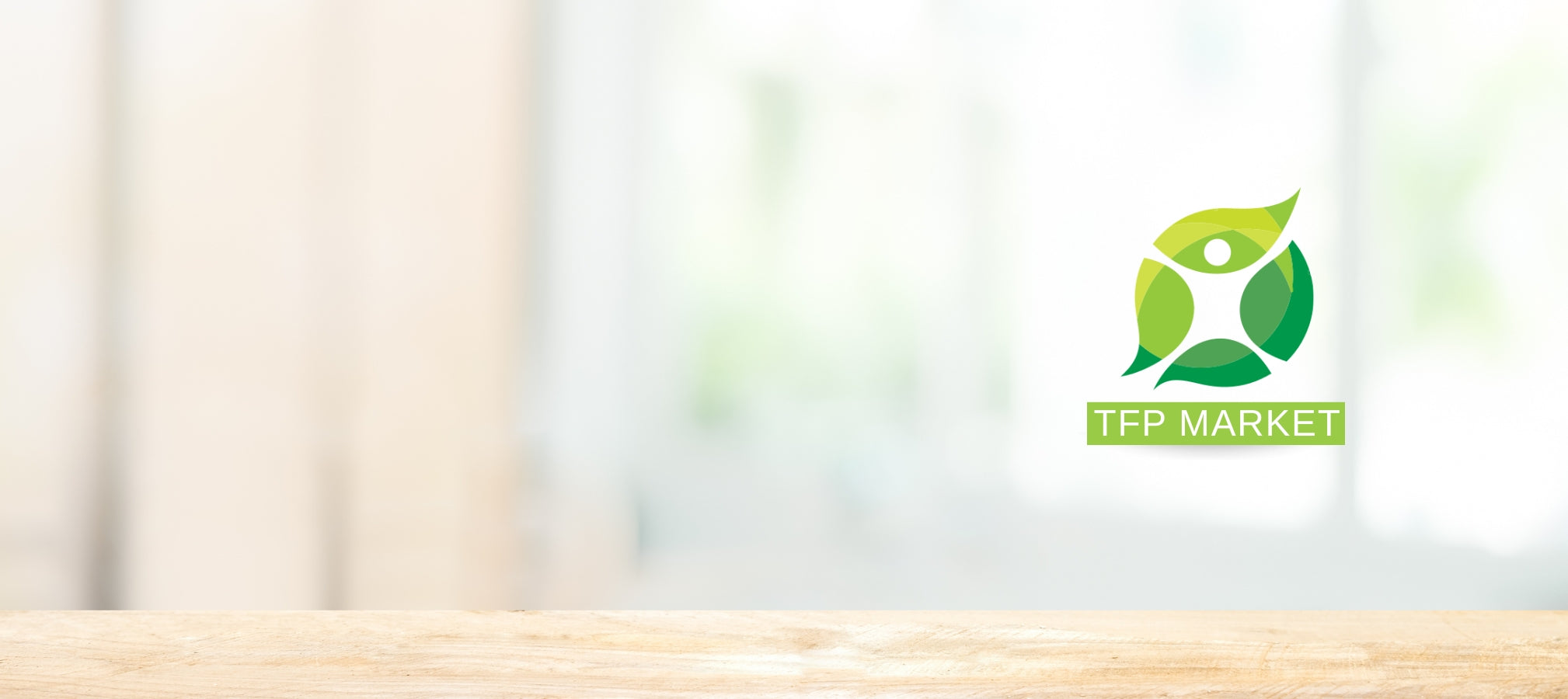 TFP Market logo displayed above a natural wooden surface with a soft wellness-themed background.